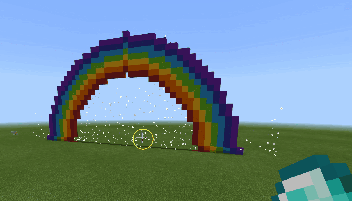 Image animée qui montre un arc-en-ciel et des feux d'artifice.