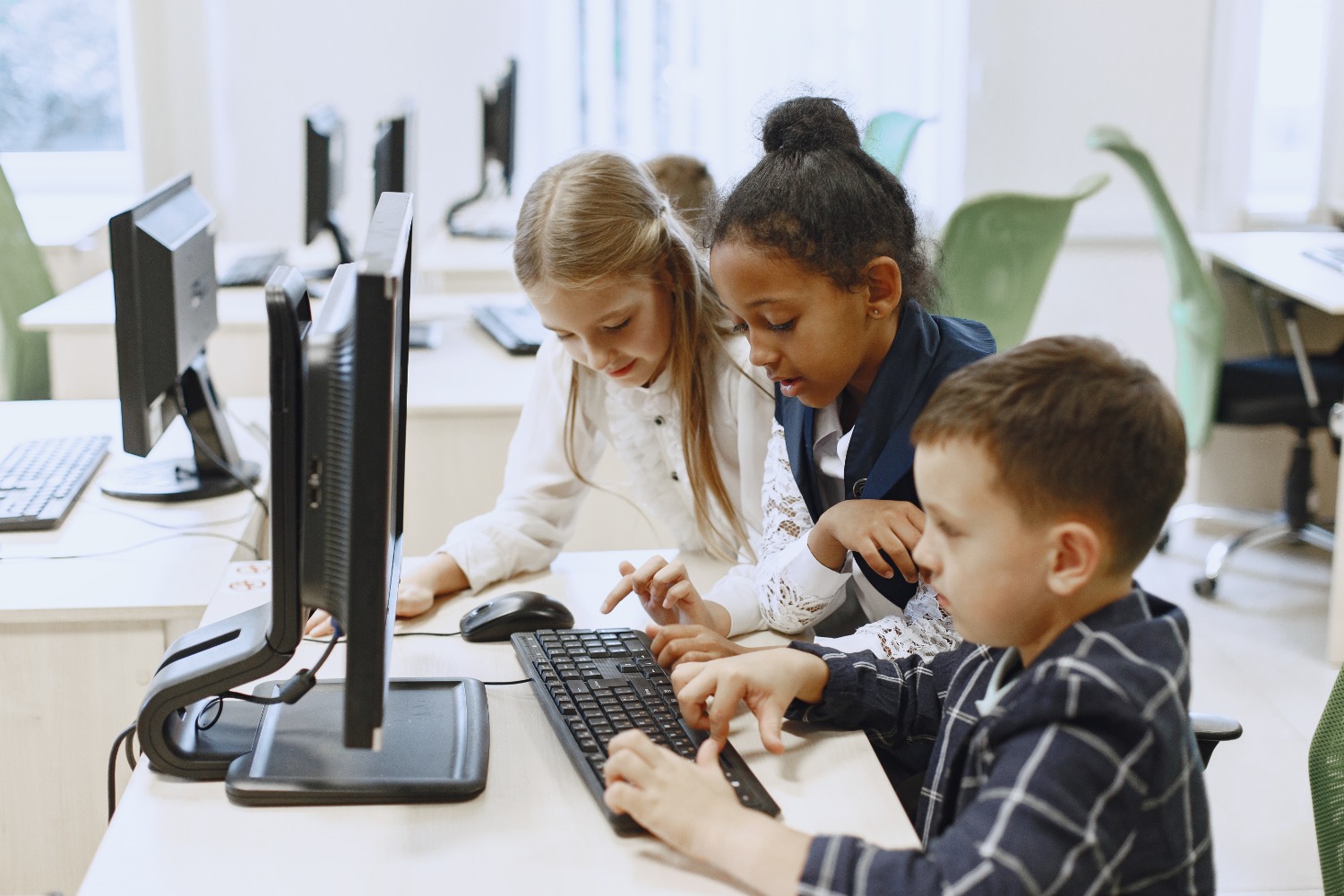 Students with various digital devices